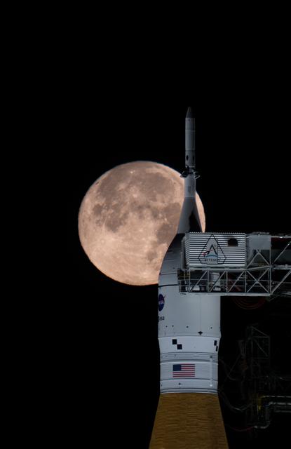 NASA image: Full Moon Rising Over Full Artemis II Stack at Launch Pad 39B